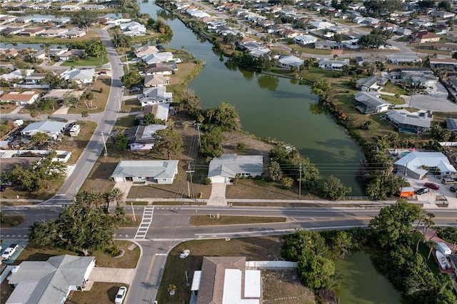 aerial view with a water view and a residential view