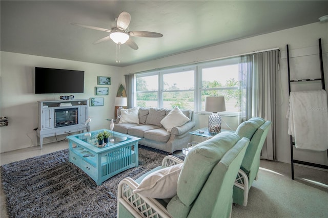 living room featuring a ceiling fan
