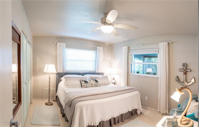 512 Shamrock Blvd, Venice, FL 34293 - bedroom featuring baseboards, a ceiling fan, and light carpet