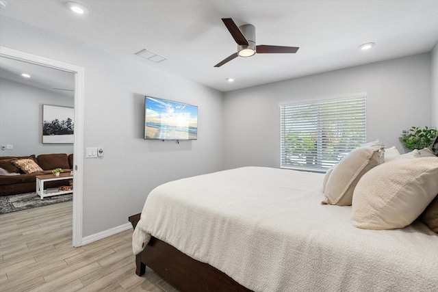 bedroom with visible vents, baseboards, ceiling fan, recessed lighting, and light wood-style flooring