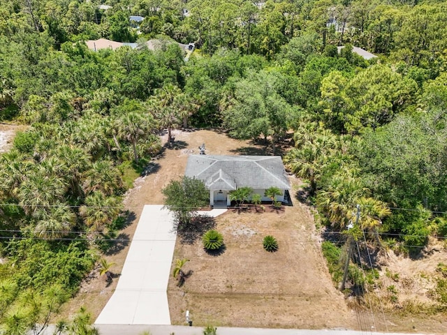 aerial view featuring a forest view