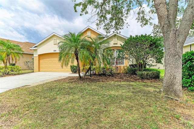 6546 Blue Grosbeak Cir, Lakewood Ranch, FL 34202 - obstructed view of property featuring stucco siding, concrete driveway, an attached garage, and a front lawn