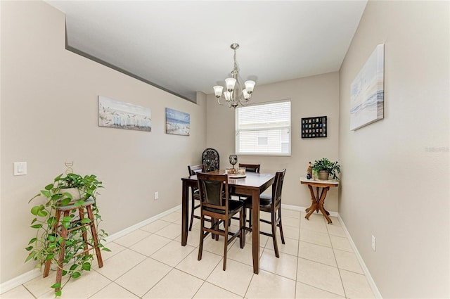 6546 Blue Grosbeak Cir, Lakewood Ranch, FL 34202 - dining room featuring a chandelier, baseboards, and light tile patterned flooring