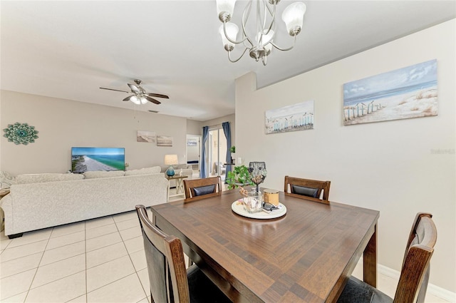6546 Blue Grosbeak Cir, Lakewood Ranch, FL 34202 - dining room featuring light tile patterned flooring, a chandelier, and ceiling fan