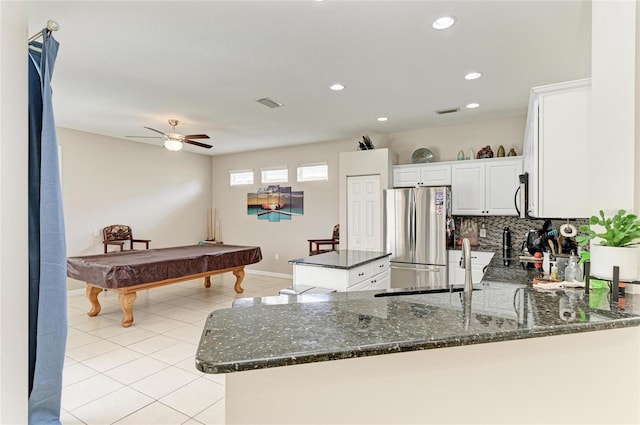 6546 Blue Grosbeak Cir, Lakewood Ranch, FL 34202 - kitchen featuring stainless steel appliances, light tile patterned floors, billiards table, dark stone countertops, and ceiling fan