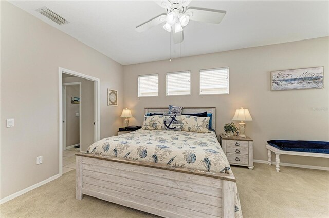 6546 Blue Grosbeak Cir, Lakewood Ranch, FL 34202 - bedroom featuring light colored carpet, baseboards, and ceiling fan