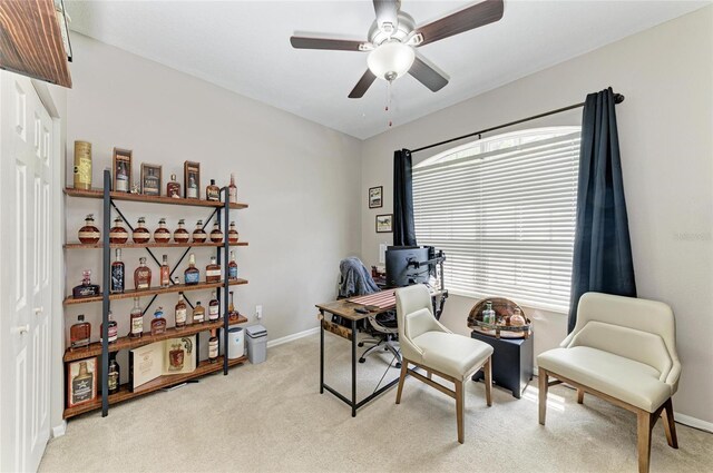 6546 Blue Grosbeak Cir, Lakewood Ranch, FL 34202 - home office featuring light colored carpet, ceiling fan, and baseboards