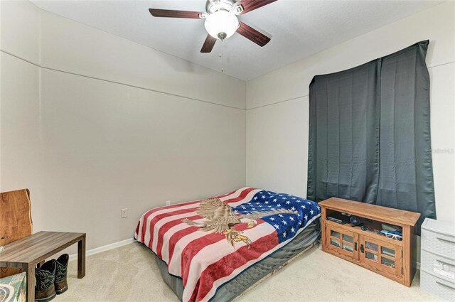 6546 Blue Grosbeak Cir, Lakewood Ranch, FL 34202 - carpeted bedroom featuring ceiling fan and baseboards
