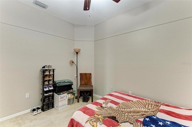 6546 Blue Grosbeak Cir, Lakewood Ranch, FL 34202 - carpeted bedroom with baseboards and ceiling fan