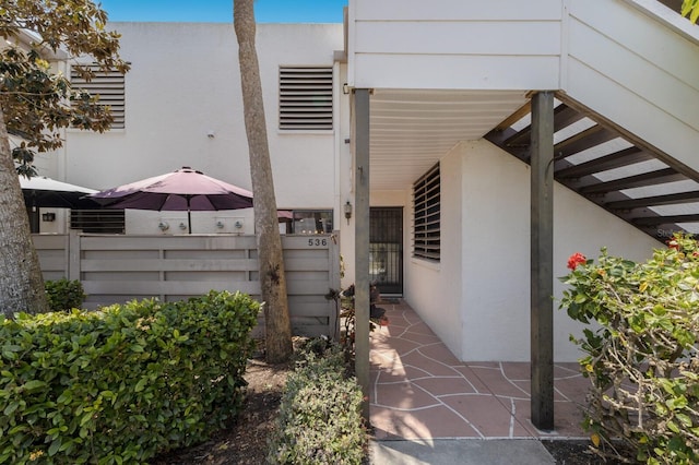 536 Lakeside Dr Unit 0, Bradenton, FL 34210 - view of home's exterior with fence and stucco siding