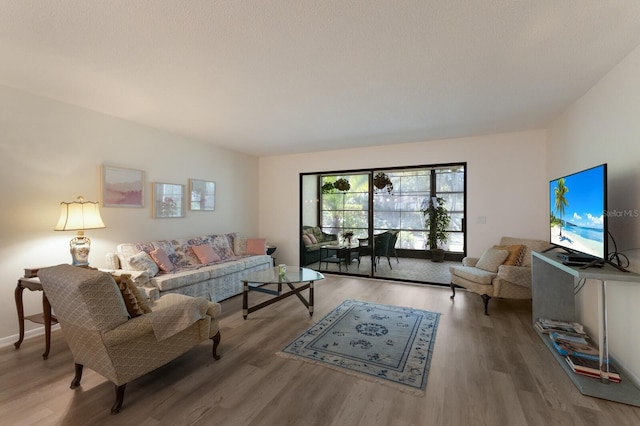 536 Lakeside Dr Unit 0, Bradenton, FL 34210 - living room featuring wood finished floors