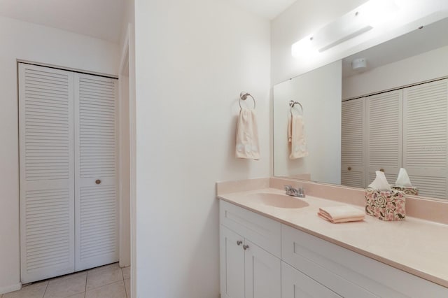536 Lakeside Dr Unit 0, Bradenton, FL 34210 - bathroom with a closet, vanity, and tile patterned flooring