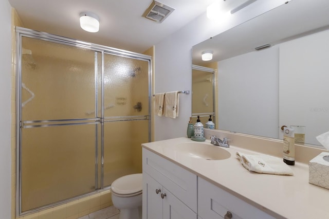 536 Lakeside Dr Unit 0, Bradenton, FL 34210 - bathroom featuring a shower stall, toilet, and vanity