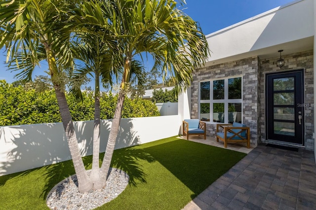 view of yard featuring a patio and a fenced backyard