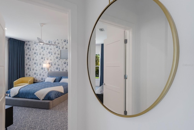 bedroom featuring visible vents and carpet floors