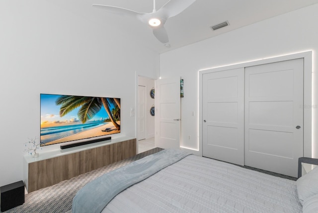 bedroom with a closet and visible vents