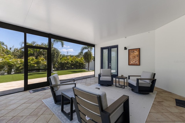 sunroom featuring french doors