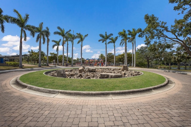 surrounding community featuring a lawn