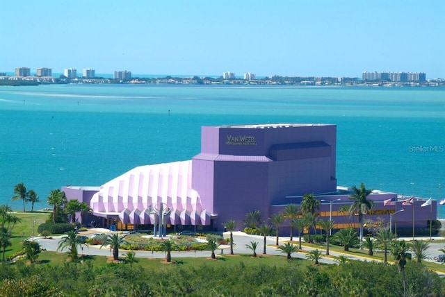view of water feature with a city view