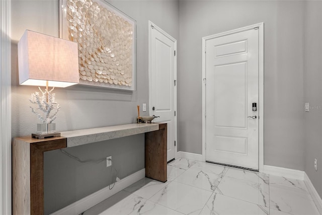 13319 Deep Blue Pl, Bradenton, FL 34211 - foyer entrance with baseboards and light marble finish flooring