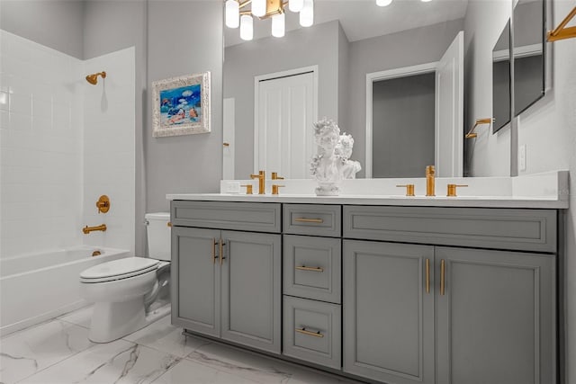 13319 Deep Blue Pl, Bradenton, FL 34211 - full bath with double vanity, toilet, bathtub / shower combination, and marble look tile flooring