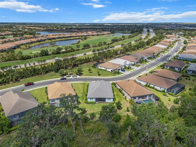 13319 Deep Blue Pl, Bradenton, FL 34211 - aerial perspective of suburban area with a large body of water and a local golf course
