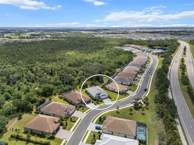 13319 Deep Blue Pl, Bradenton, FL 34211 - aerial perspective of suburban area with a forest