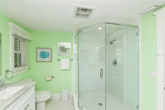 205 Elm Ave, Anna Maria, FL 34216 - full bath with visible vents, a stall shower, toilet, vanity, and tile patterned flooring