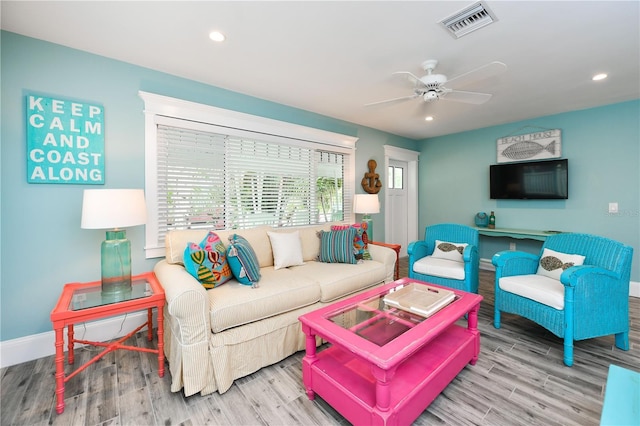 205 Elm Ave, Anna Maria, FL 34216 - living area with wood finished floors, visible vents, recessed lighting, and baseboards