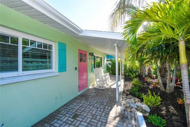 205 Elm Ave, Anna Maria, FL 34216 - view of patio / terrace with covered porch