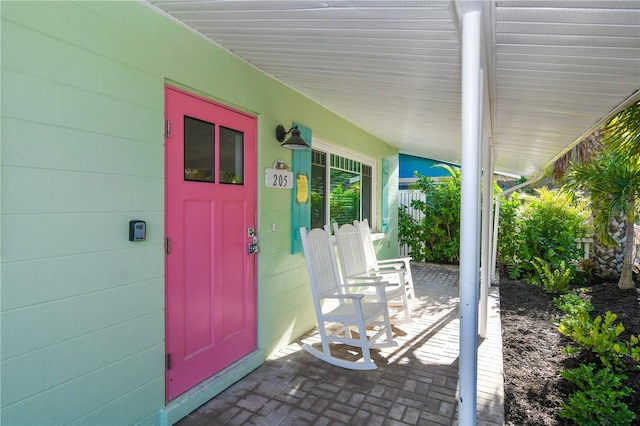 205 Elm Ave, Anna Maria, FL 34216 - view of patio / terrace with covered porch