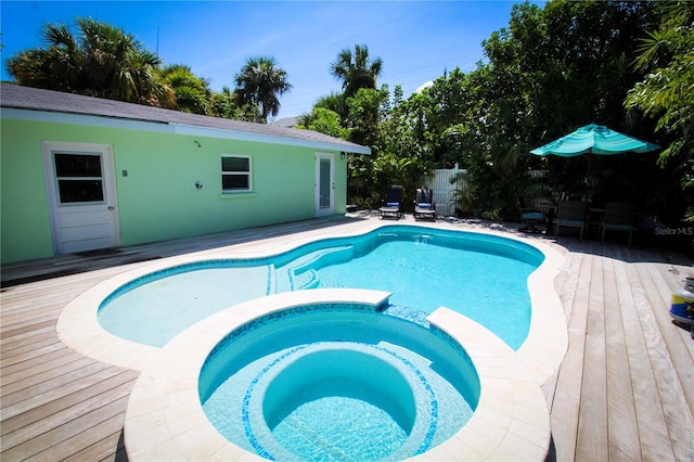 205 Elm Ave, Anna Maria, FL 34216 - view of pool featuring a deck, fence, and a pool with connected hot tub