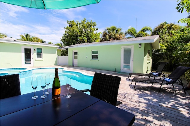 205 Elm Ave, Anna Maria, FL 34216 - view of pool with an in ground hot tub, a wooden deck, and a fenced in pool
