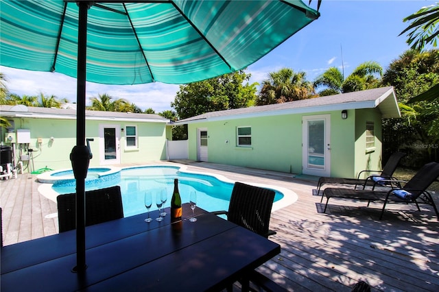205 Elm Ave, Anna Maria, FL 34216 - view of pool with a wooden deck and a pool with connected hot tub