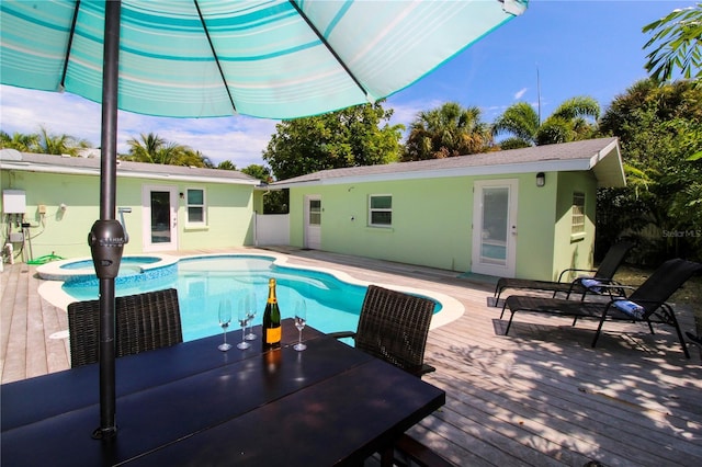 205 Elm Ave, Anna Maria, FL 34216 - view of swimming pool with a deck and a pool with connected hot tub