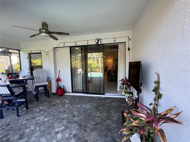 view of patio / terrace with a ceiling fan