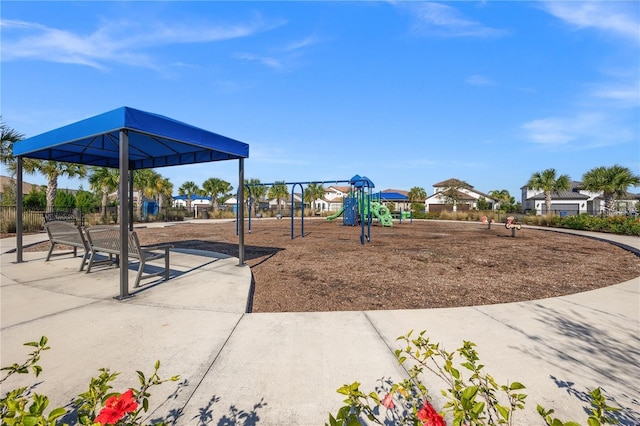 community playground featuring fence
