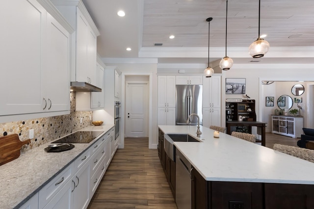 14210 9th Ter NE, Bradenton, FL 34212 - kitchen featuring stainless steel appliances, a sink, under cabinet range hood, an island with sink, and dark wood finished floors