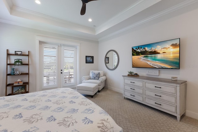 14210 9th Ter NE, Bradenton, FL 34212 - bedroom featuring crown molding, light carpet, a tray ceiling, access to exterior, and recessed lighting