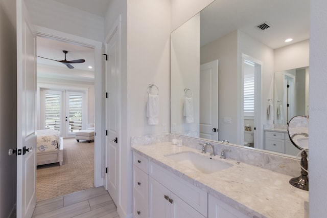 14210 9th Ter NE, Bradenton, FL 34212 - ensuite bathroom featuring a ceiling fan, toilet, vanity, and recessed lighting