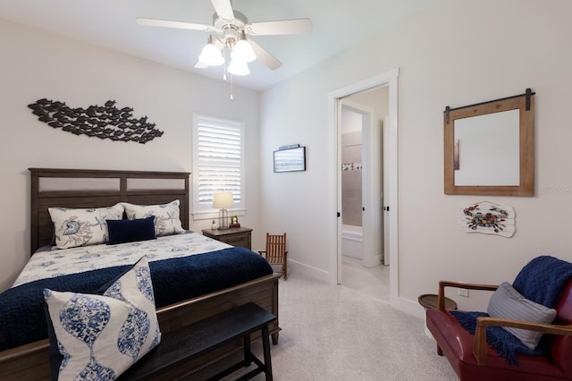 14210 9th Ter NE, Bradenton, FL 34212 - bedroom featuring light colored carpet, baseboards, a ceiling fan, and connected bathroom