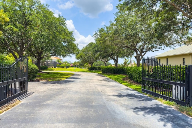 14210 9th Ter NE, Bradenton, FL 34212 - view of street with a gated entry and a gate