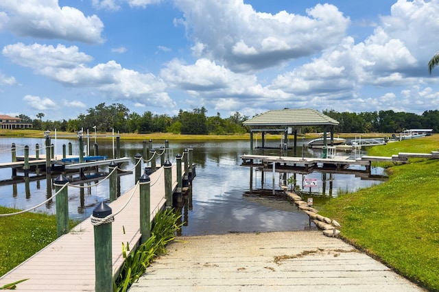 14210 9th Ter NE, Bradenton, FL 34212 - dock area with boat lift, a boat ramp, and a water view