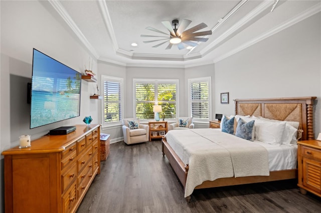 bedroom featuring ceiling fan, a raised ceiling, baseboards, dark wood-style floors, and ornamental molding