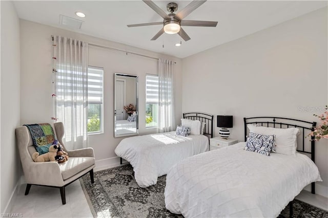 bedroom featuring baseboards, recessed lighting, and a ceiling fan