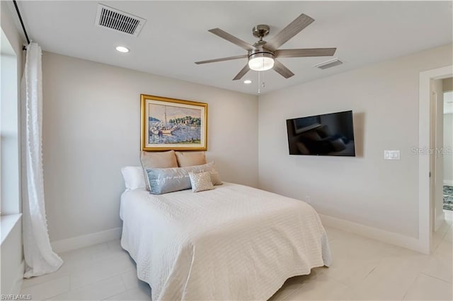 bedroom with light tile patterned floors, visible vents, a ceiling fan, and baseboards
