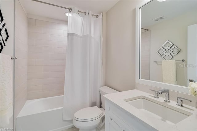 bathroom with toilet, visible vents, shower / bath combo with shower curtain, and vanity
