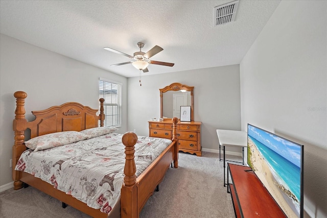 1723 Fred Ives St, Ruskin, FL 33570 - bedroom featuring light colored carpet, visible vents, baseboards, and a ceiling fan
