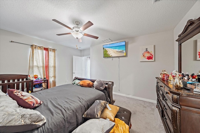 1723 Fred Ives St, Ruskin, FL 33570 - bedroom featuring light colored carpet, a textured ceiling, visible vents, a ceiling fan, and baseboards