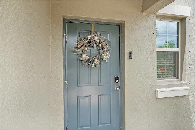 1723 Fred Ives St, Ruskin, FL 33570 - entrance to property featuring stucco siding